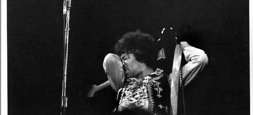 Hendrix signs records in a shop in the afternoon and headlines the Hollywood Bowl at night