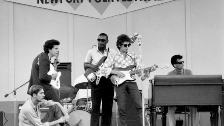 Dylan plugs in at Newport and splits folk history in two