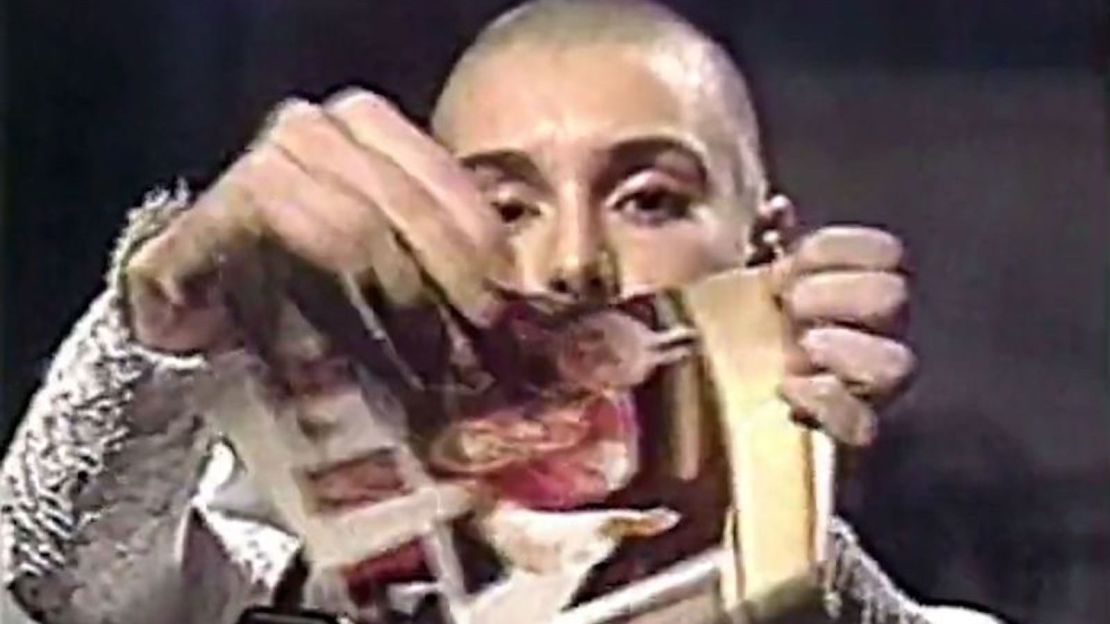 Sinéad O'Connor tears up the Pope's photo live, and the industry makes her pay