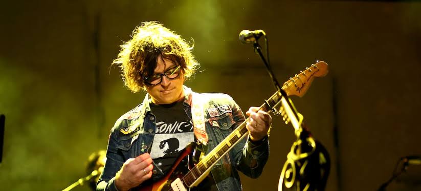 Ryan Adams shoots a video with the Twin Towers behind him and has four days left