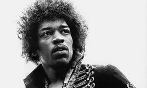 Jimi Hendrix is buried beside his mother, with Miles Davis among the mourners