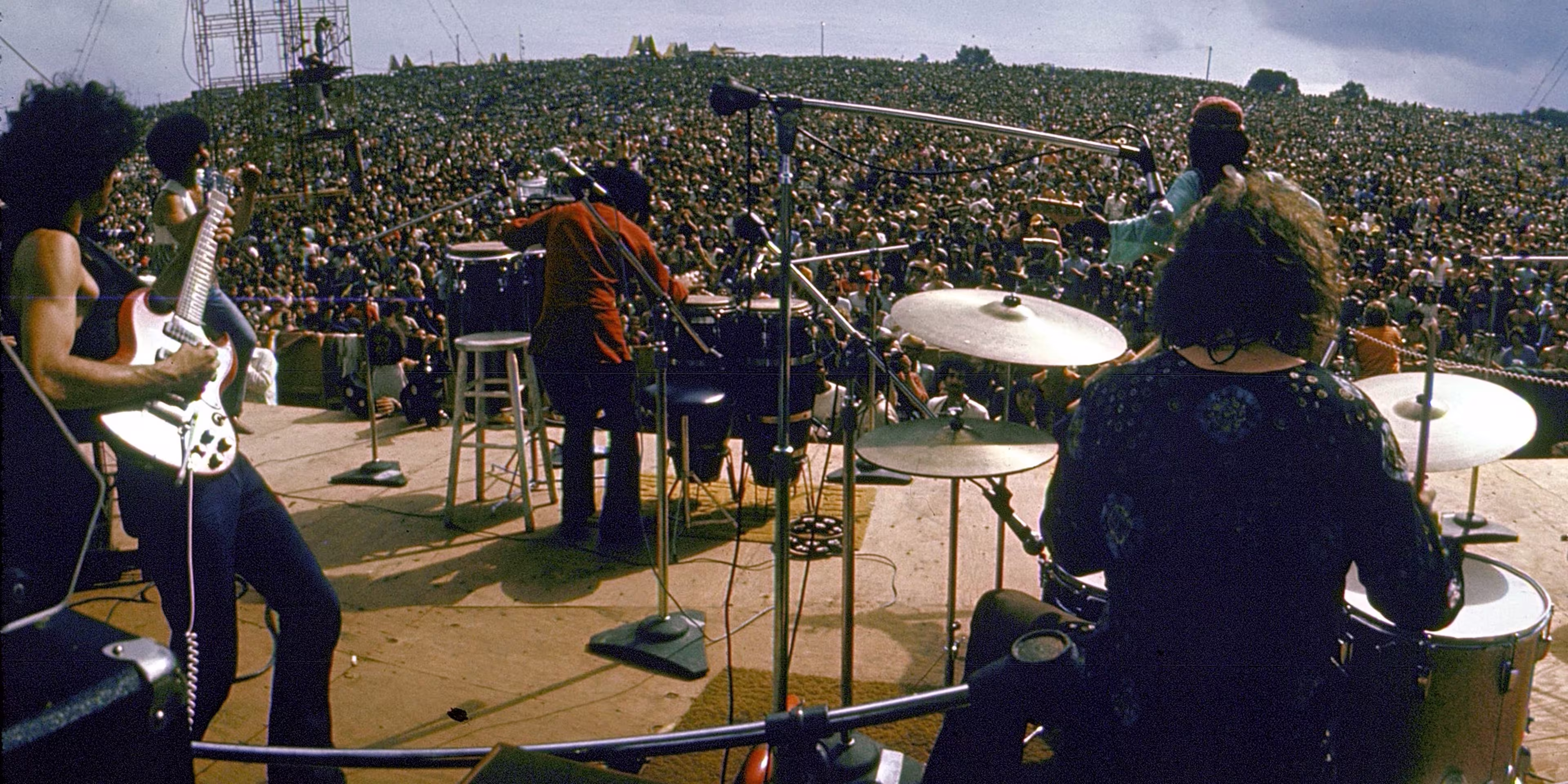 Woodstock begins: three days of peace, music and a myth forever