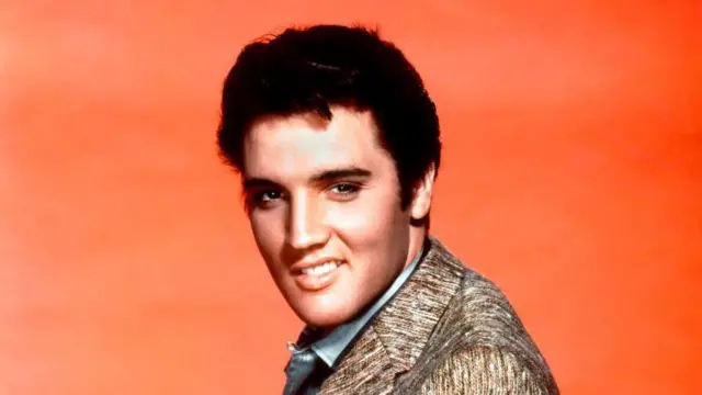 Way Down hits number one in Britain with Elvis two weeks in the ground