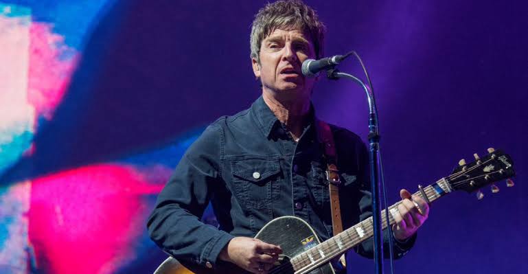 A drunk in the crowd shoves Noel Gallagher into the monitors in Toronto